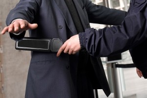 Security check with metal detector at an airport
